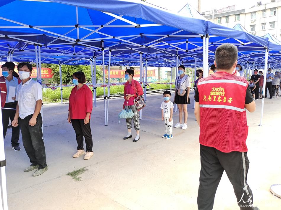 7��25�����Ͼ��ֿڅ^(q��)��־Ը����С��������ǰ��z�y�ľ��񱣳�һ���g�����Y��ꖔz