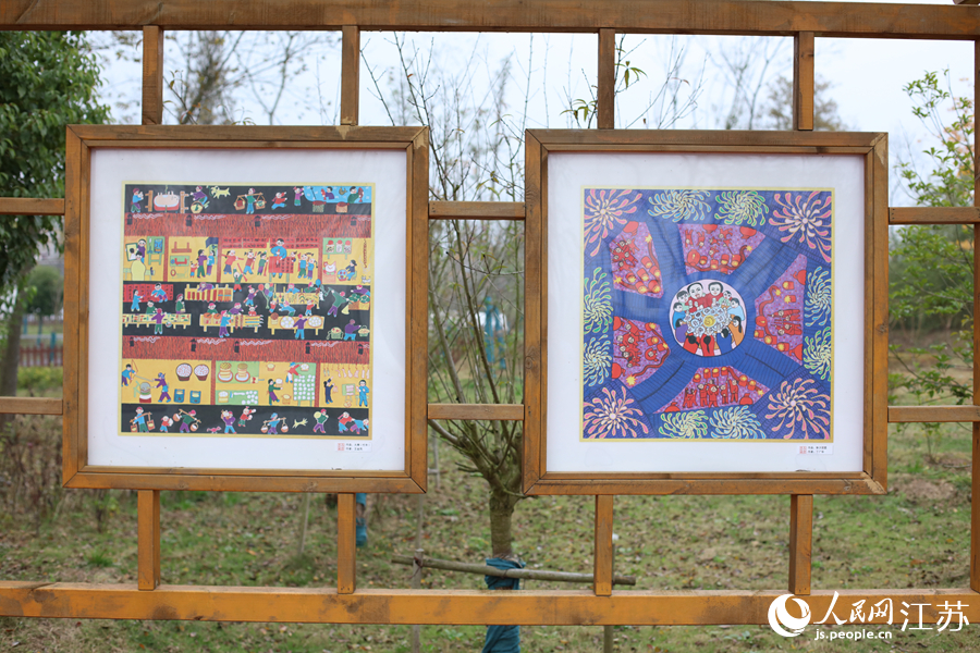 蔡橋河濕地公園農(nóng)民畫長廊。人民網(wǎng) 冷金明攝