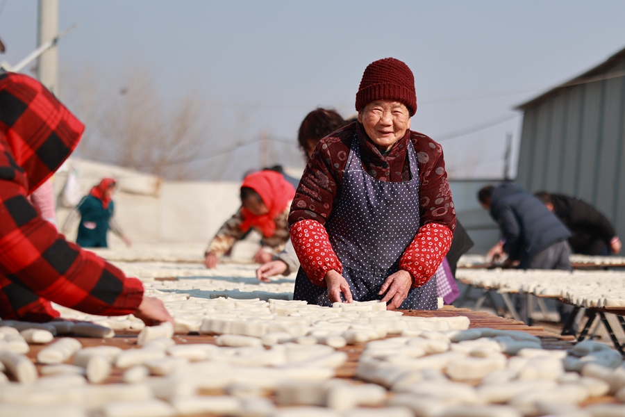 村民臉上洋溢著笑容。史道智攝
